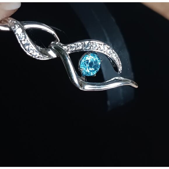 Zales Unstoppable Love Blue Topaz Infinity Necklace - Picture 3 of 10